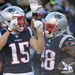 Foxborough, MA 12/23/18- The New England Patriots Chris Hogan celebrates with teammate James White after White?s 27 yard touchdown run against the Buffalo Bills during second quarter NFL action at Gillette Stadium on Sunday, Dec. 23, 2018.(Matthew J. Lee/Globe Staff)
